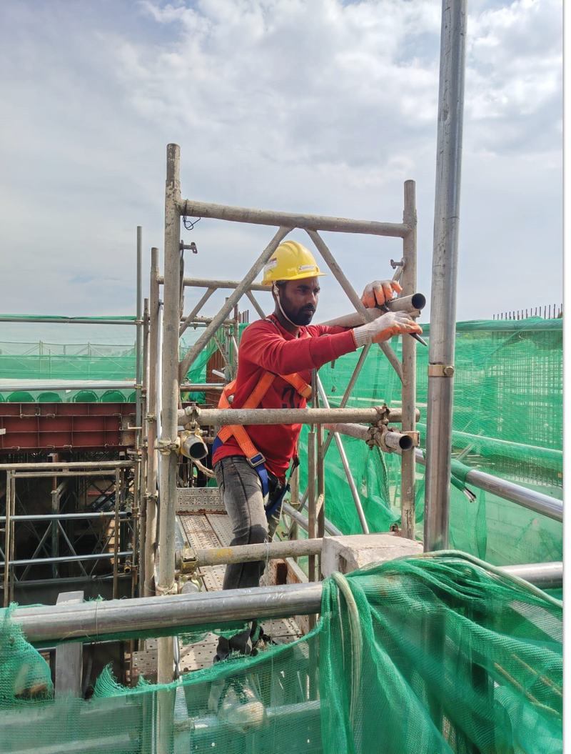 S&P worker on scaffold